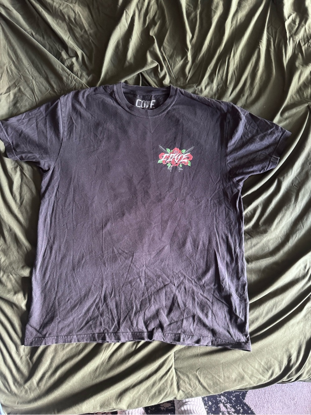 COVE Black Tee with Floral Chest Logo